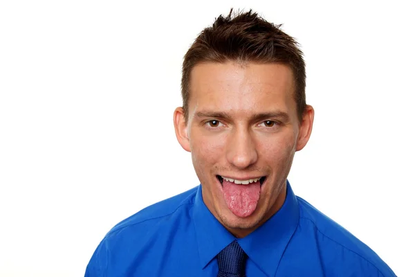 Geschäftsmann streckt die Zunge heraus — Stockfoto