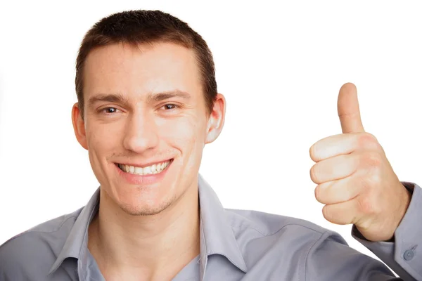 Smiling man gesturing thumb up sign — Stock Photo, Image