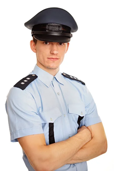 Young policeman with folded hands — Stock Photo, Image