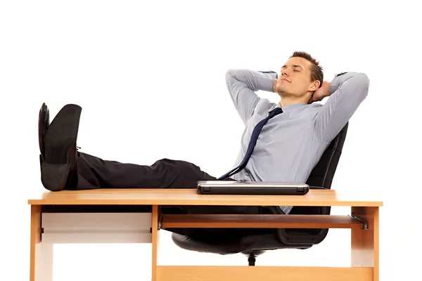 Businessman relaxes in work — Stock Photo, Image