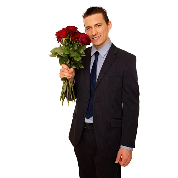 Man holds bouquet of red roses — Stock Photo, Image