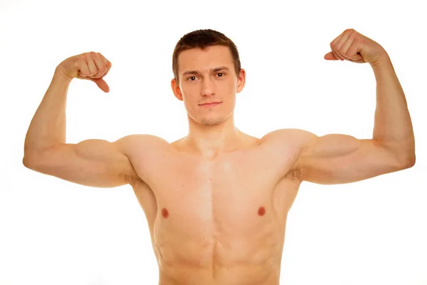 Athletic man shirtless shows biceps — Stock Photo, Image