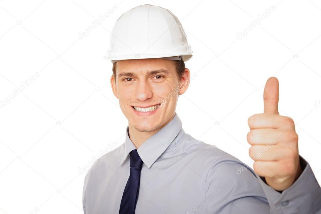 Businessman shows thumb up sign