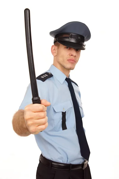 Angry policeman with police baton — Stock Photo, Image