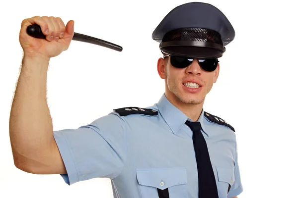 Boos politieman toont politie baton — Stockfoto