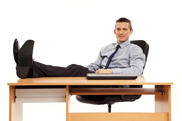 Young businessman relaxing at work — Stock Photo, Image