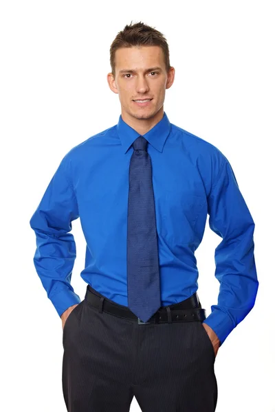 Businessman standing with hands in pockets — Stock Photo, Image