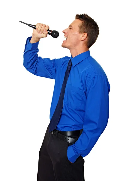 Podnikatel zpívá do mikrofonu — Stock fotografie