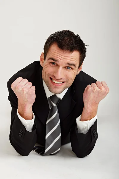 Handsome happy businessman Stock Picture