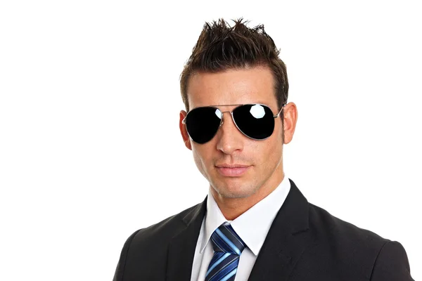 Zakenman in pak met zonnebril — Stockfoto
