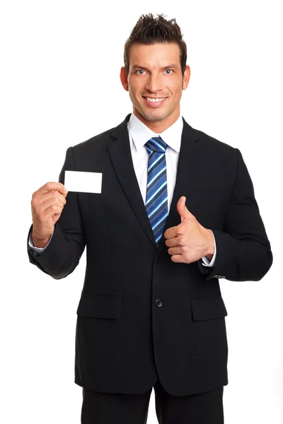 Handsome businessman shows business card — Stock Photo, Image