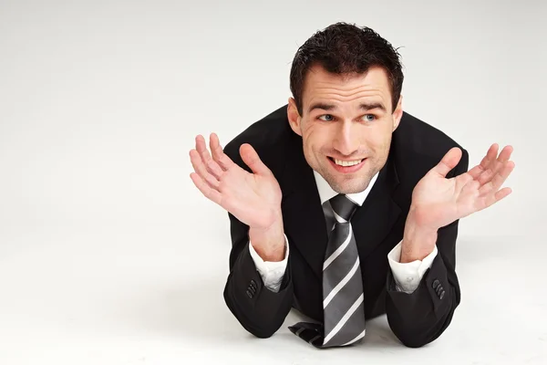 Thinking businessman showing his hands — Stock Photo, Image