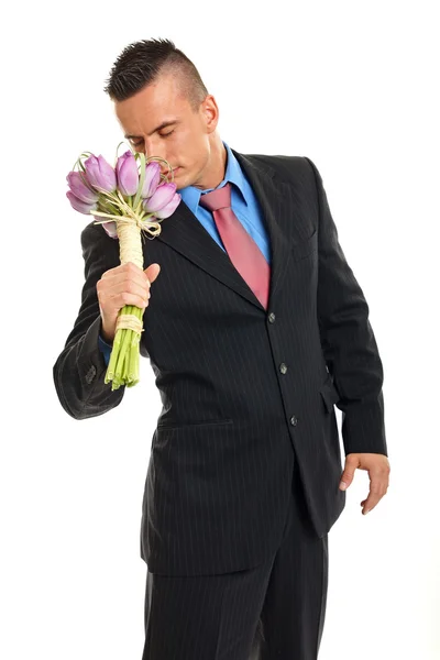 Man holds bouquet of tulips — Stock Photo, Image