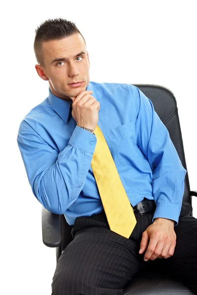 Businessman sitting on chair and thinking — Stock Photo, Image