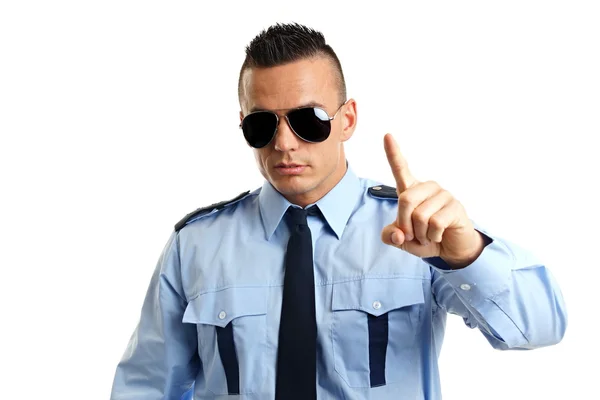 Policeman pointing towards camera — Stock Photo, Image