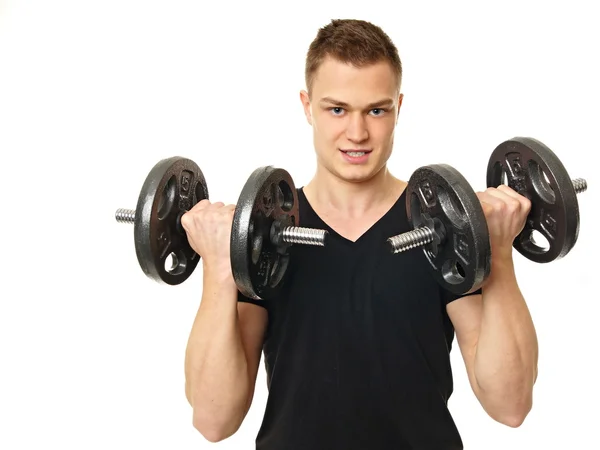 Exercícios de homem com halteres — Fotografia de Stock