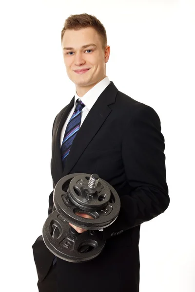 Businessman holding dumbbells — Stock Photo, Image