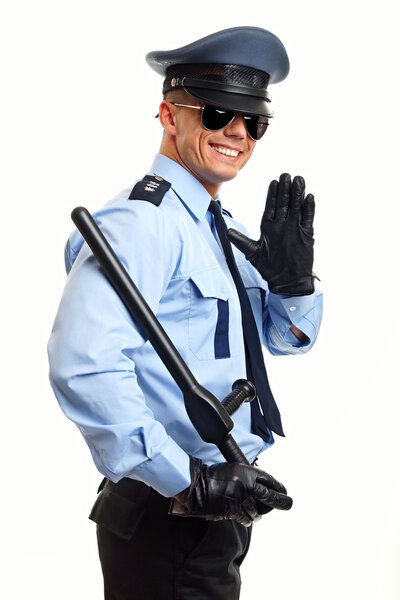 Smiling policeman greets you