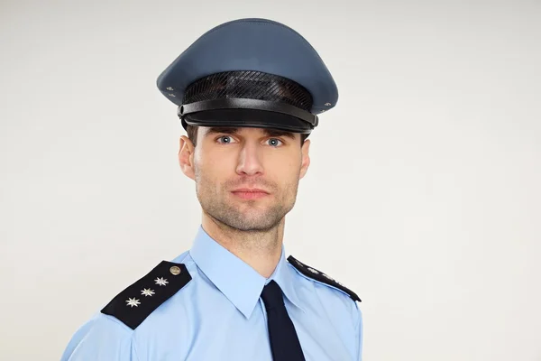 Pohledný policista v uniformě — Stock fotografie