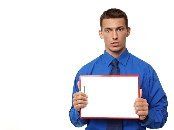 Surprised man holds blank paper sign — Stock Photo, Image