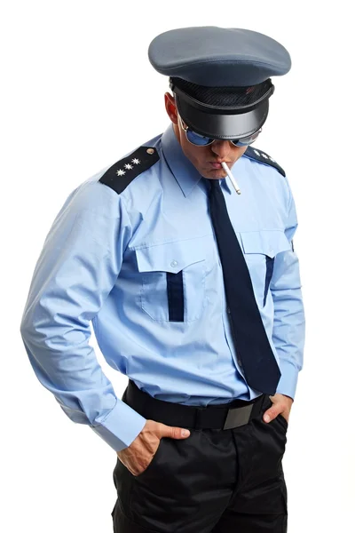 Policeman in sunglasses with cigarette Stock Photo