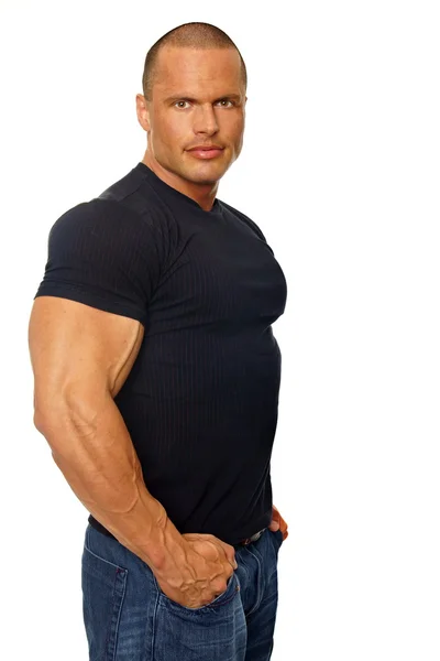 Muscular man in black shirt — Stock Photo, Image