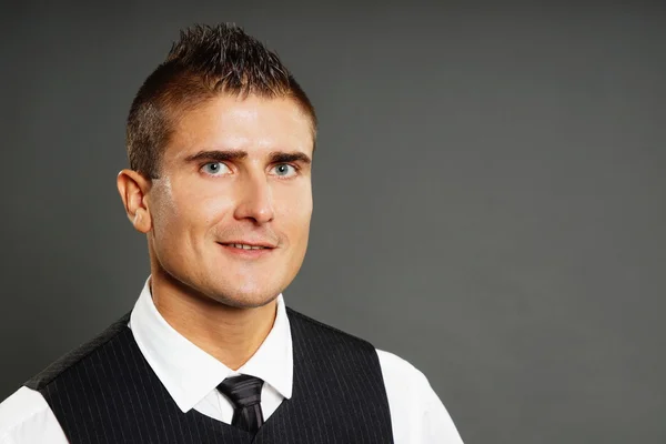 Hombre con camisa blanca y chaleco —  Fotos de Stock