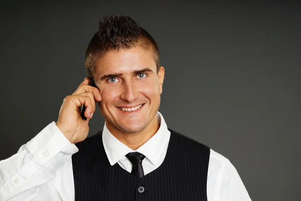 Empresário fala ao telefone — Fotografia de Stock