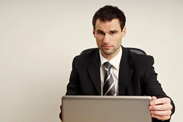 Handsome businessman at the computer — Stock Photo, Image