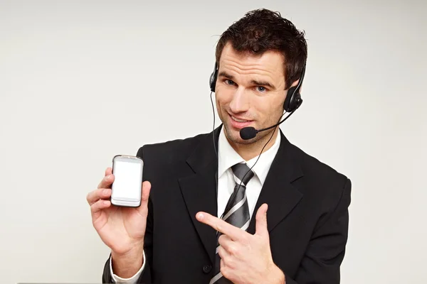 Service operator shows on mobile phone — Stock Photo, Image