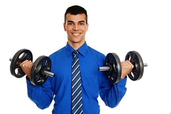 Man exercises with dumbbells — Stock Photo, Image