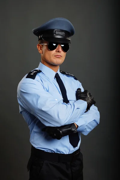 Αστυνομικός με σταυρωμένα χέρια Φωτογραφία Αρχείου