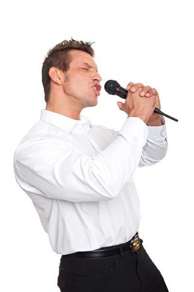 Businessman sings into the microphone — Stock Photo, Image