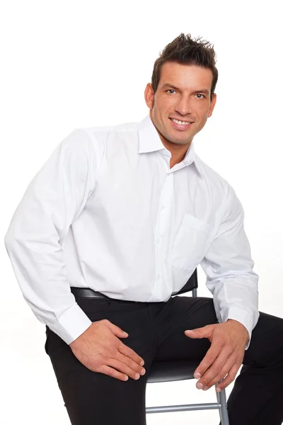 Smiling businessman in white shirt — Stock Photo, Image