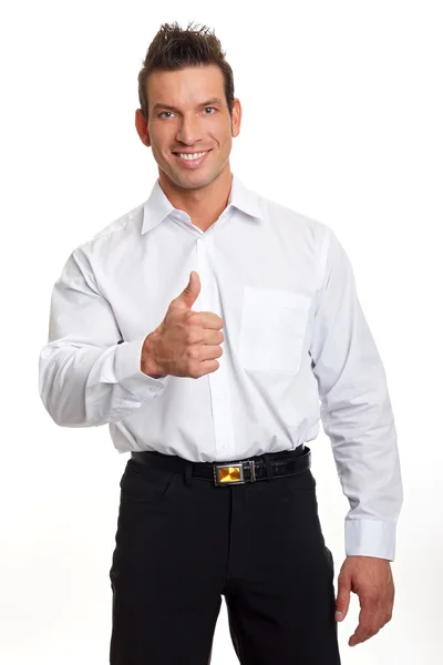 Handsome businessman gesturing thumb up sign — Stock Photo, Image