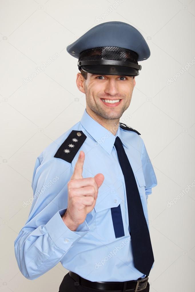 Policeman gesturing thumb up sign