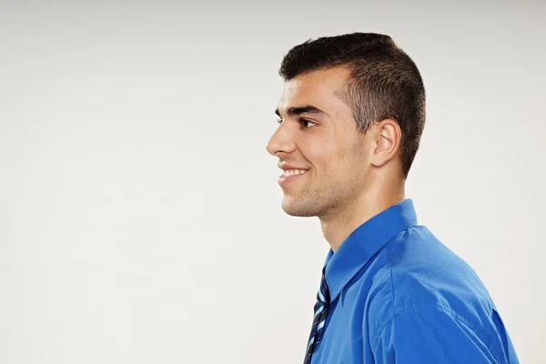 Young man in blue shirt — Stock Photo, Image