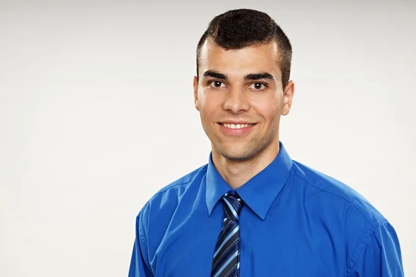 Young man in blue shirt — Stock Photo, Image