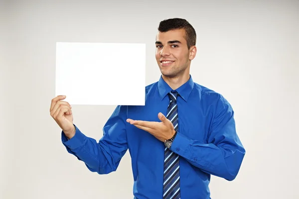 Business man at blue shirt with blank paper. — Stock Photo, Image