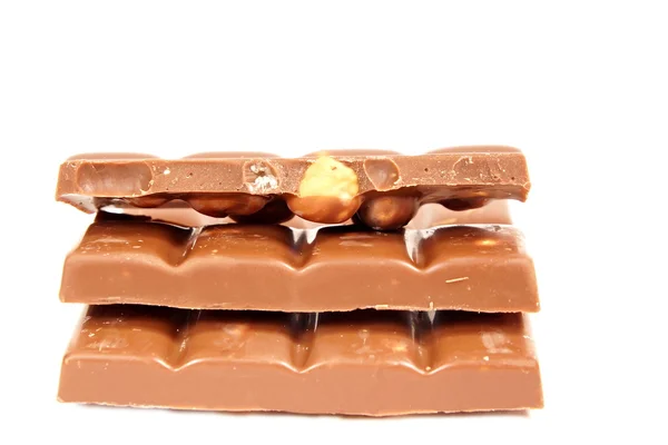 Blocks milk chocolate with hazelnuts — Stock Photo, Image