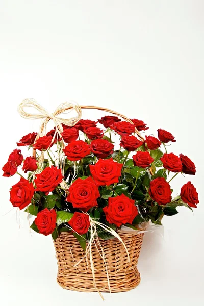 Beautiful red roses in a basket Stock Image