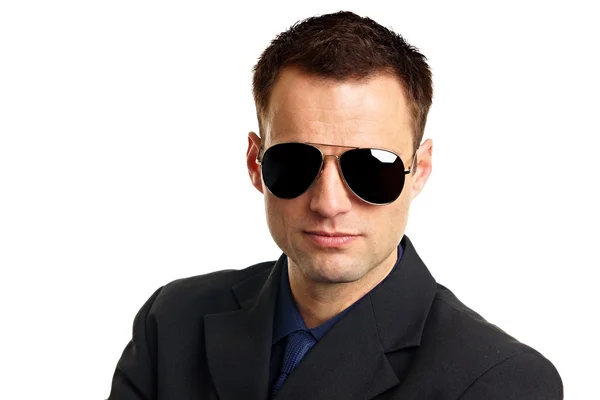 Jonge zakenman met zonnebril. — Stockfoto