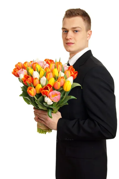 Hombre con ramo de tulipanes — Foto de Stock