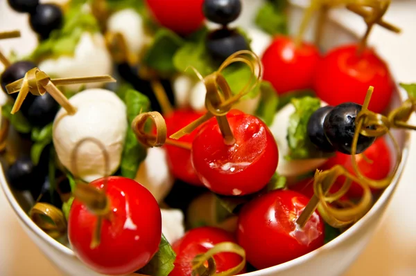 Appetizer salad on festive table — Stock Photo, Image