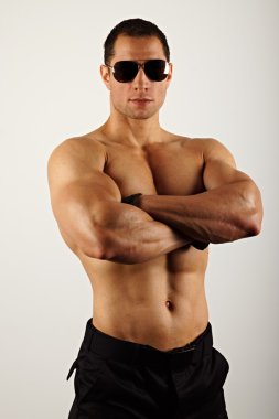 Young athletic man shirtless clipart