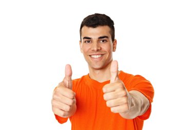 Smiling man gesturing humbs up