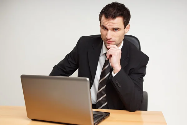 Handsome businessman at the computer — Stock Photo, Image