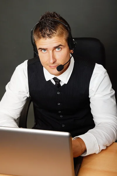 Customer operator sitting at the computer — Stock Photo, Image
