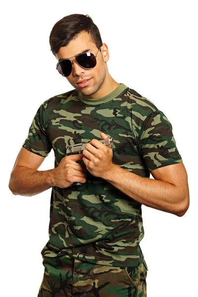 Military man with a gun — Stock Photo, Image