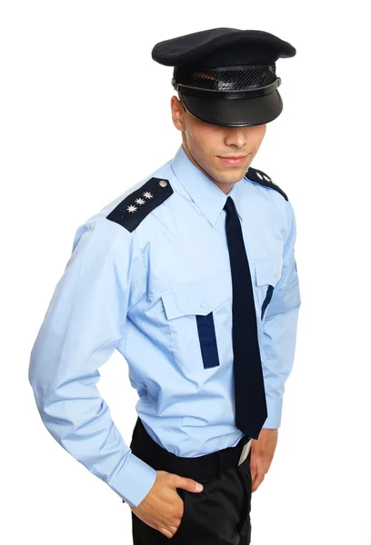 Ung polisman med handen i fickan — Stockfoto